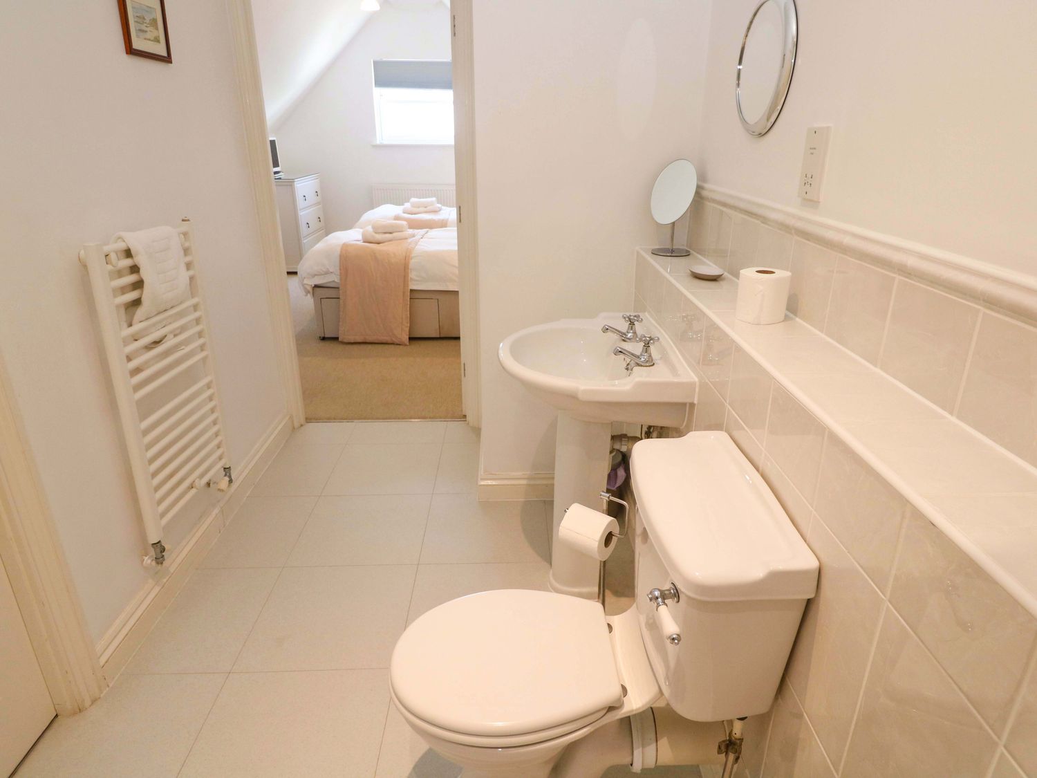 A bathroom with a sink and toilet at Meridian in Carbis Bay