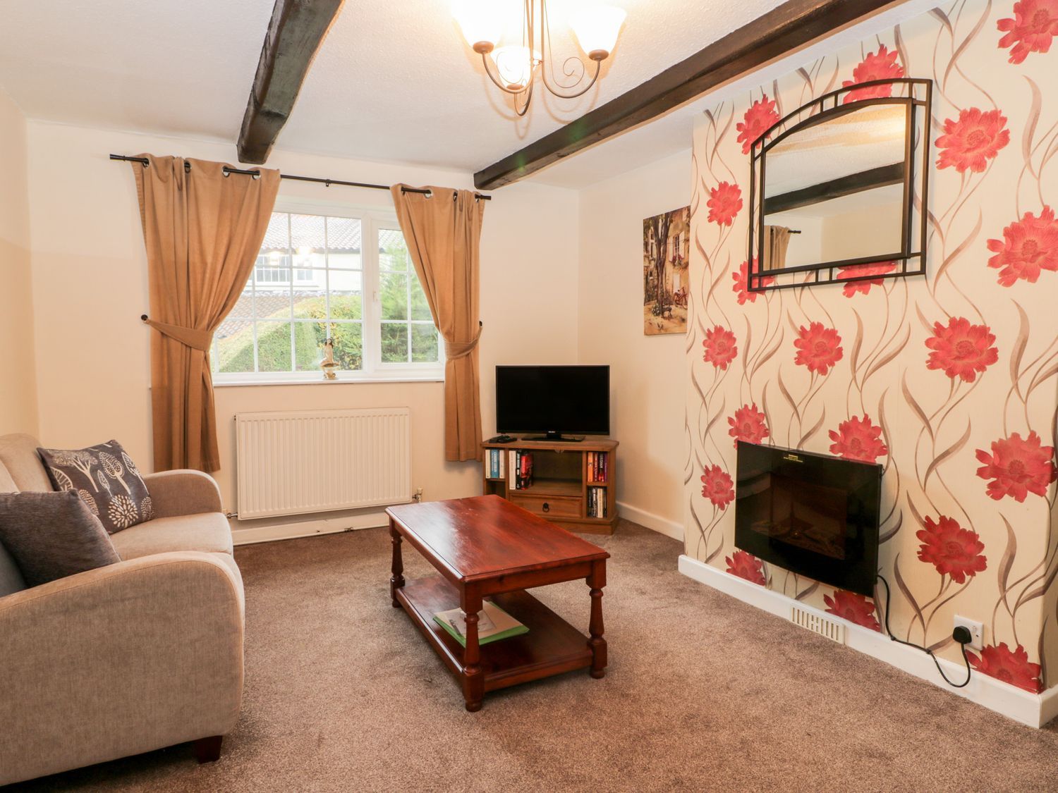 Sitting room in Orchid Cottage ( Ref 1156522 ) at Orchard Farm Holiday Cottages Hunmanby near Filey North Yorkshire