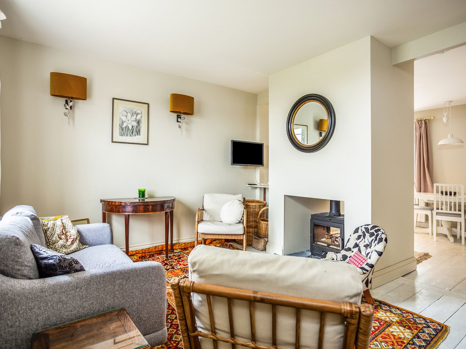 A living room with a sofa and coffee table at 8 Mariners Terrace, Chichester