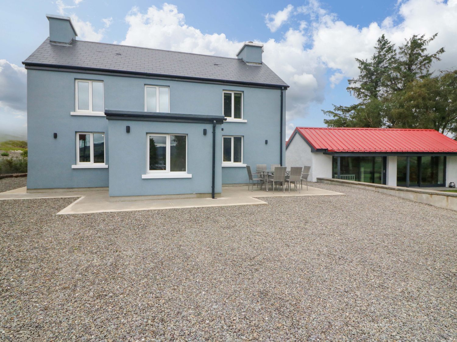 A house with a garden and a patio area at Valley View House Kealkill, County Cork