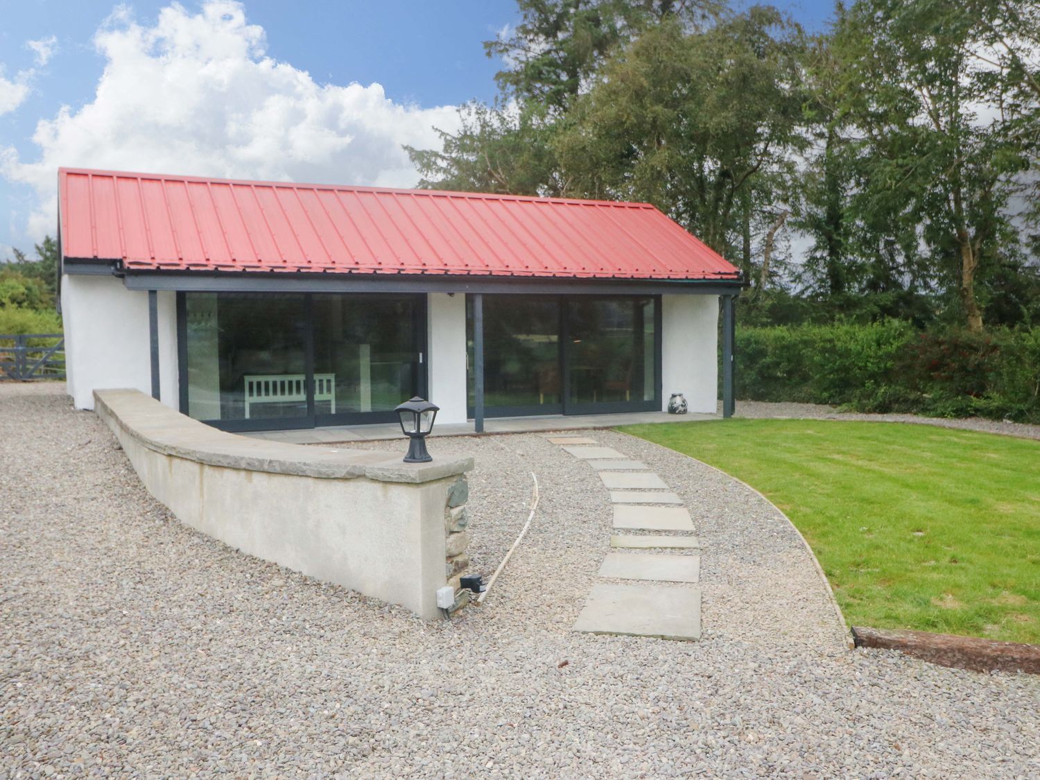 A house with a red roof and large windows at The Stall near Kealkill, County Cork