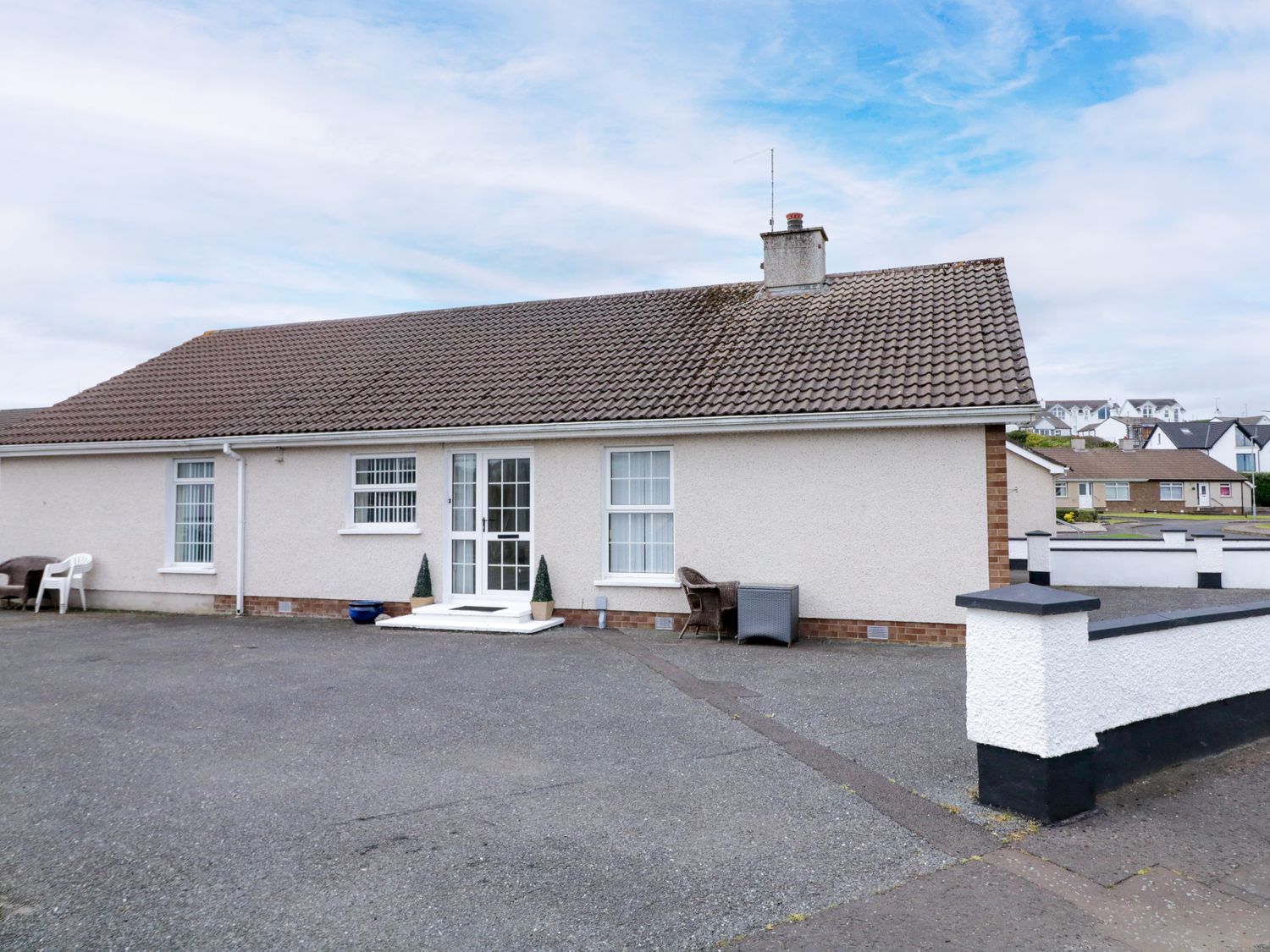 An exterior view of a house with a driveway at 3 Warke Place Castlerock