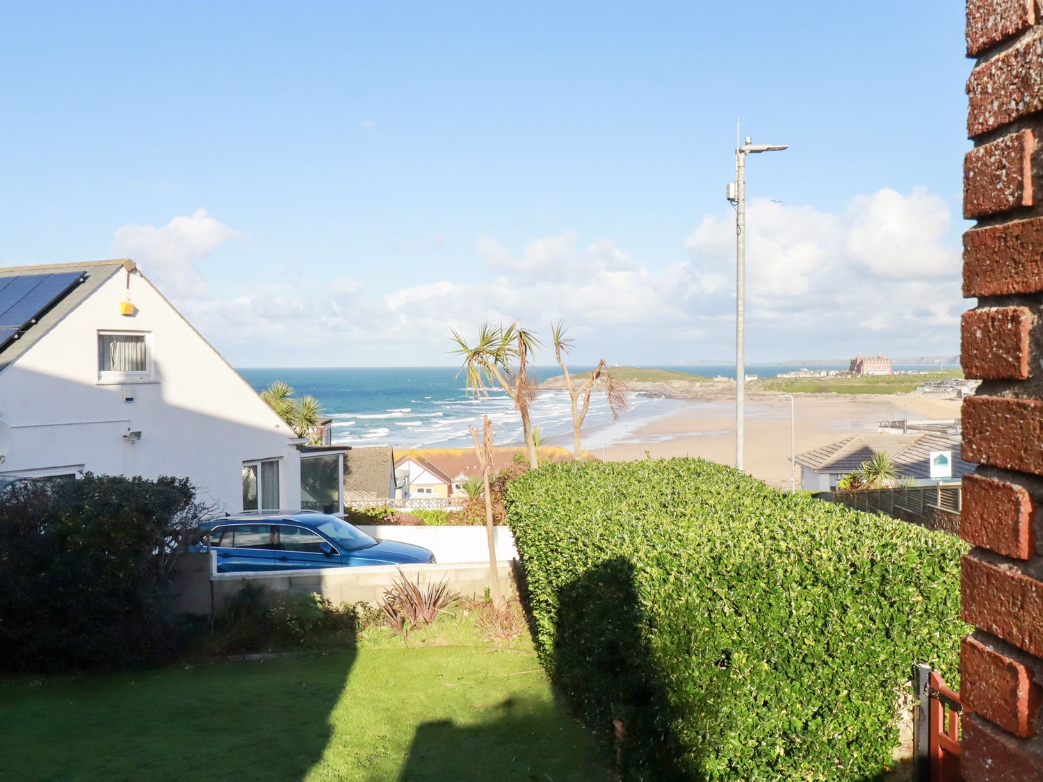 A view of the sea and beach from a property at Pipers Newquay
