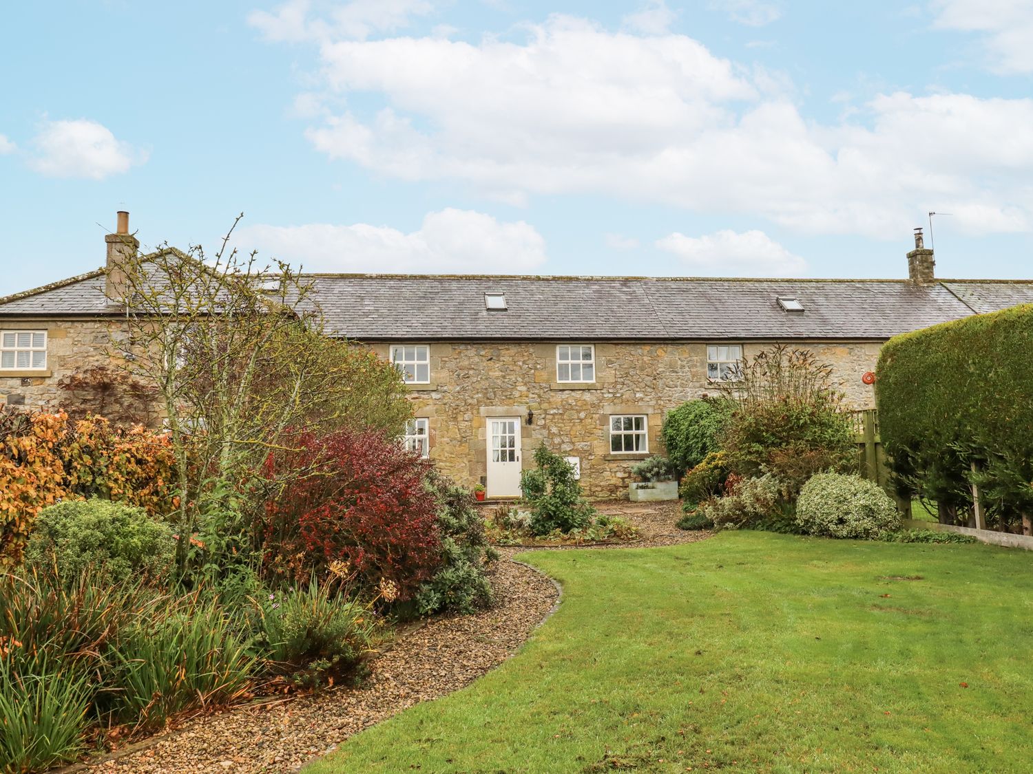 A house with garden and pathway at 3 Christon Bank Mews Alnwick