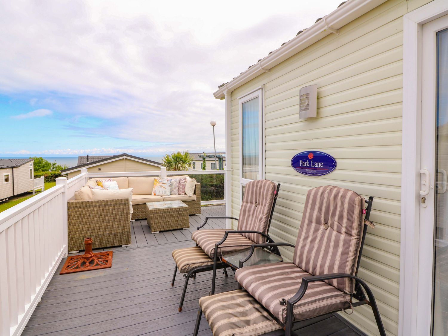 An outdoor terrace with seating at Park Lane in New Quay