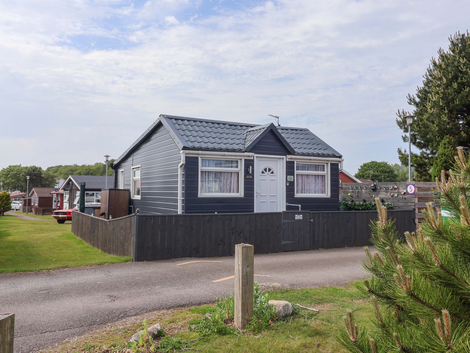 A house exterior with a fence at Sandbay in Bridlington