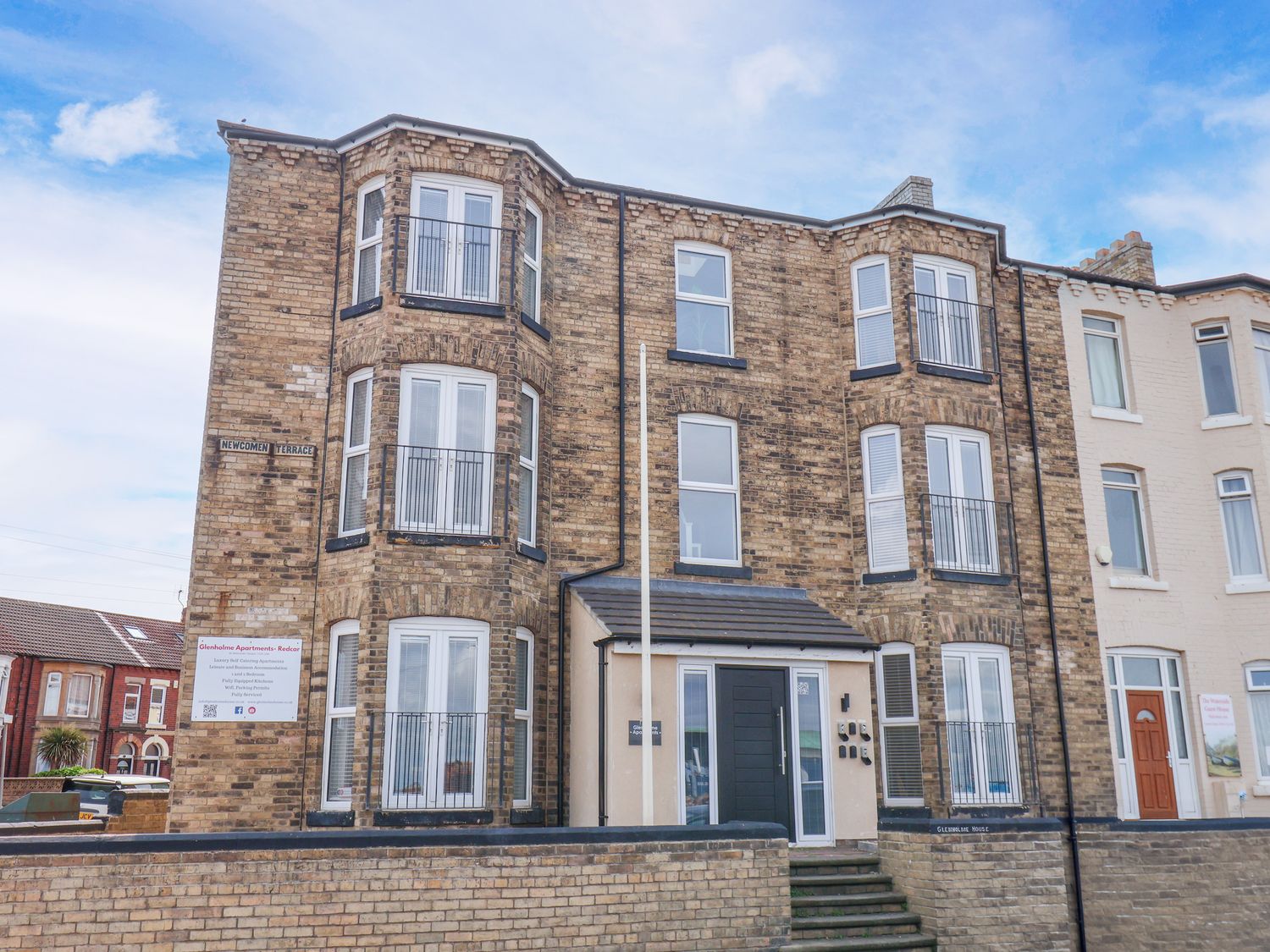 A building with balconies and front entrance at Apartment 1 (2 bed) in Redcar