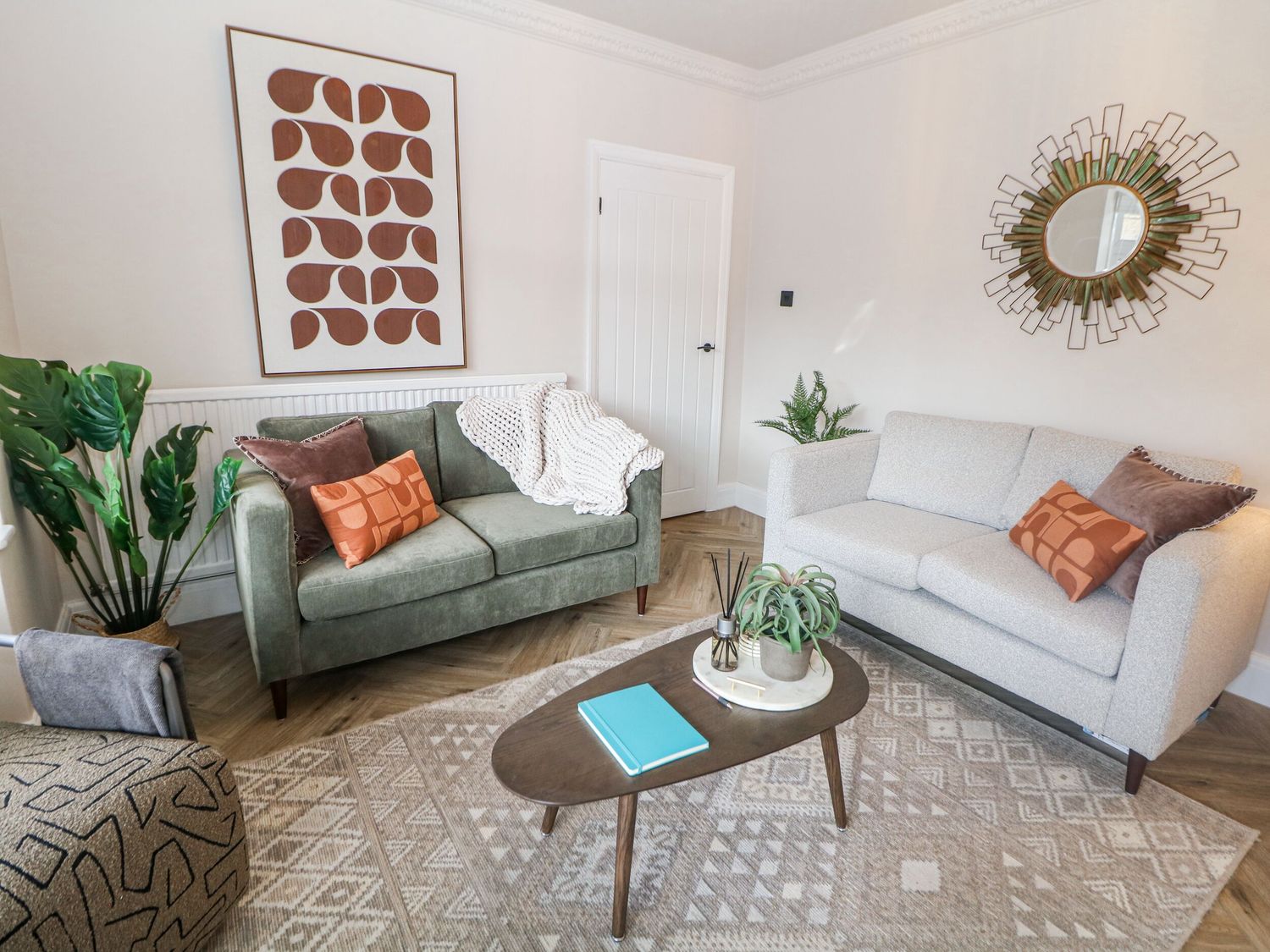 A living room with sofas and a coffee table at 37 Berry Hill Lane in Mansfield