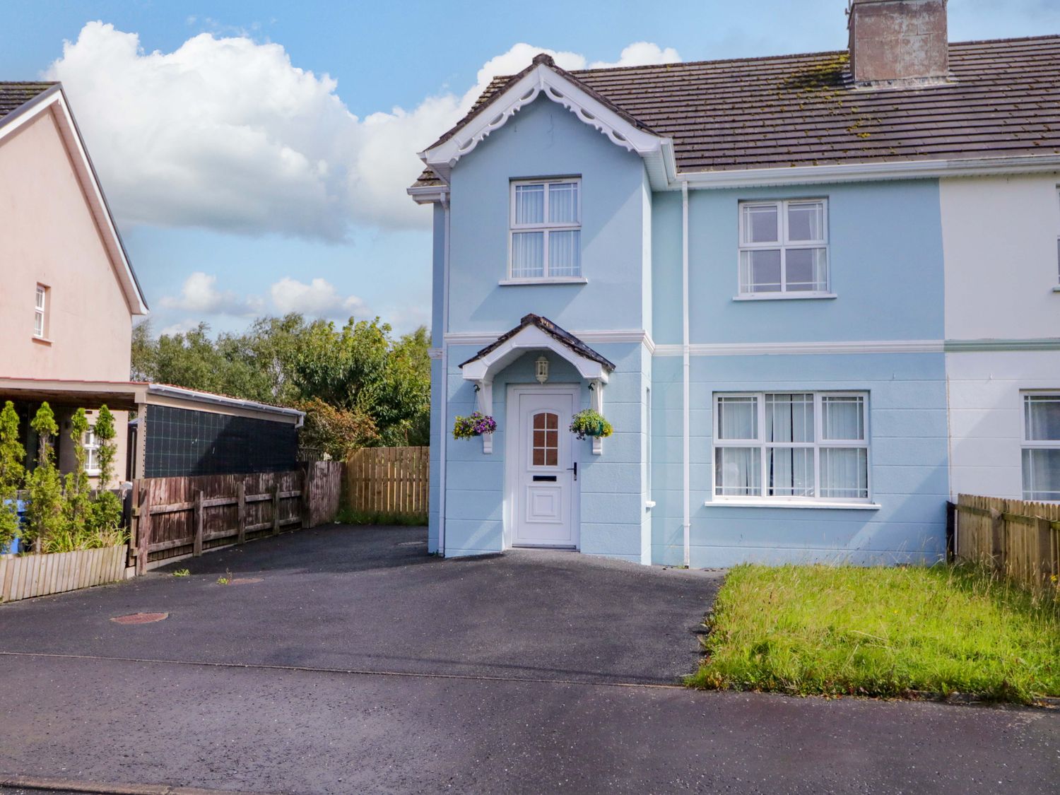A house with a driveway and garden at 7 Killybrack Glen in Omagh
