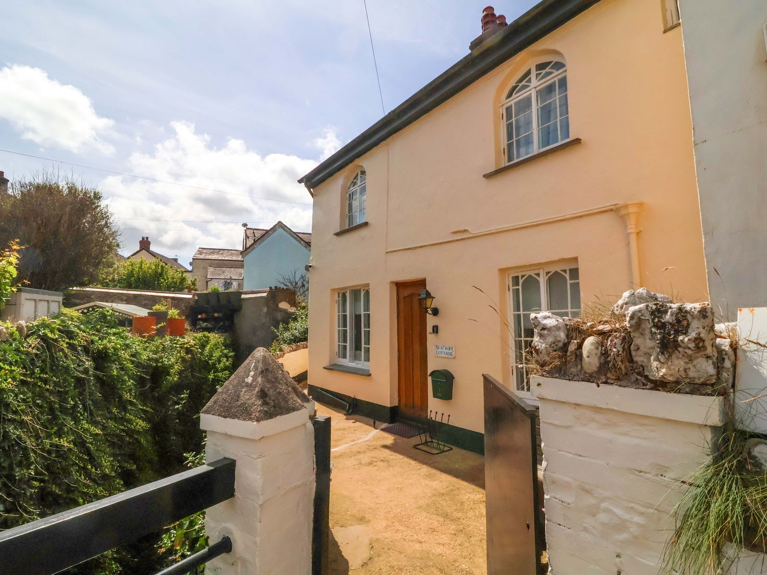 A house entrance with a garden area at Seacroft in Combe Martin