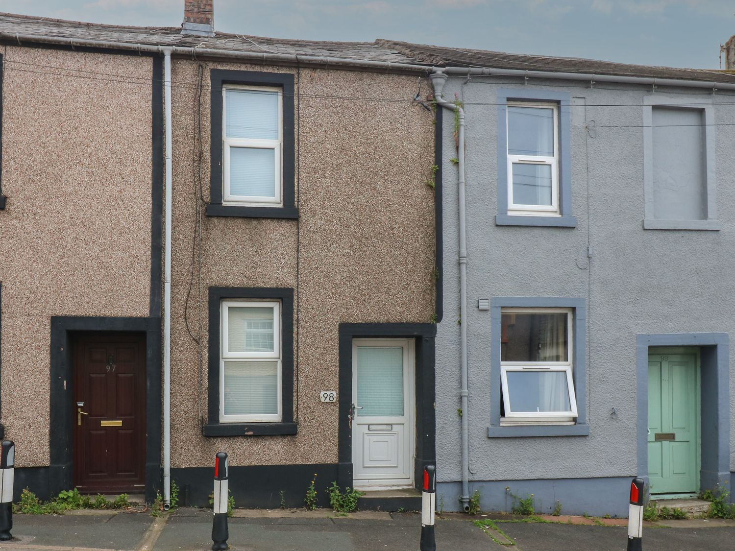 Two houses with doors and windows at Holly House in Whitehaven