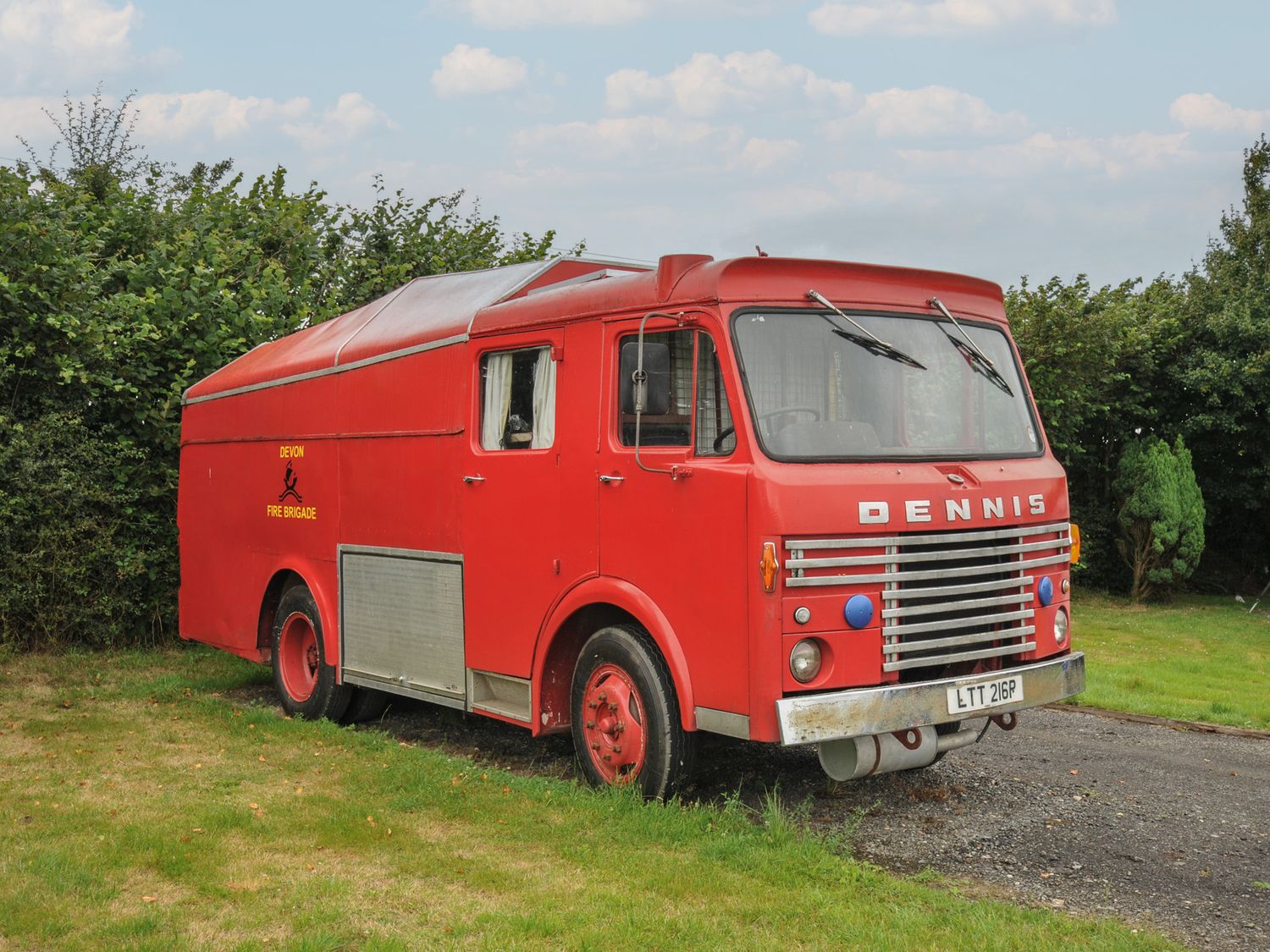 A fire engine parked on grass at Dashing Dennis - 22 Chapmanswell near Launceston