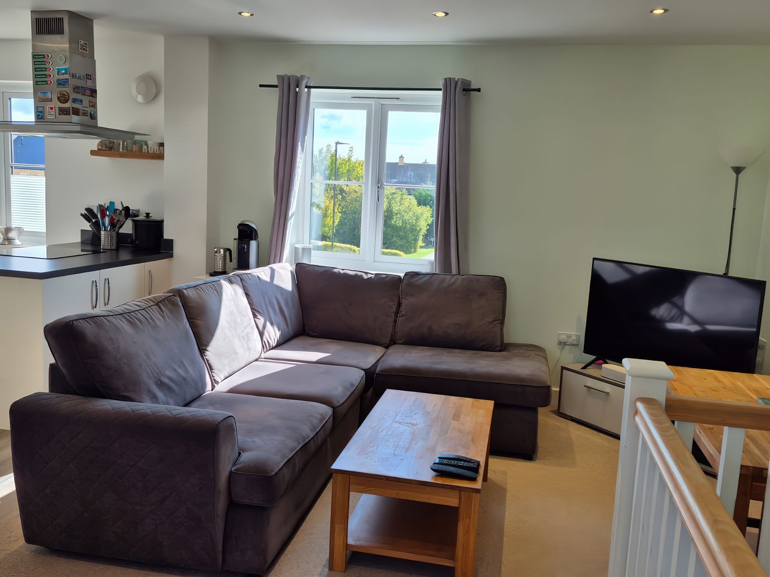 A living room with a sofa and coffee table at 54 swallow road
