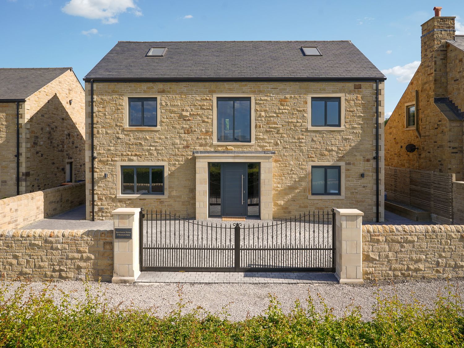 A house with a gate in front at Northstone House Blackburn