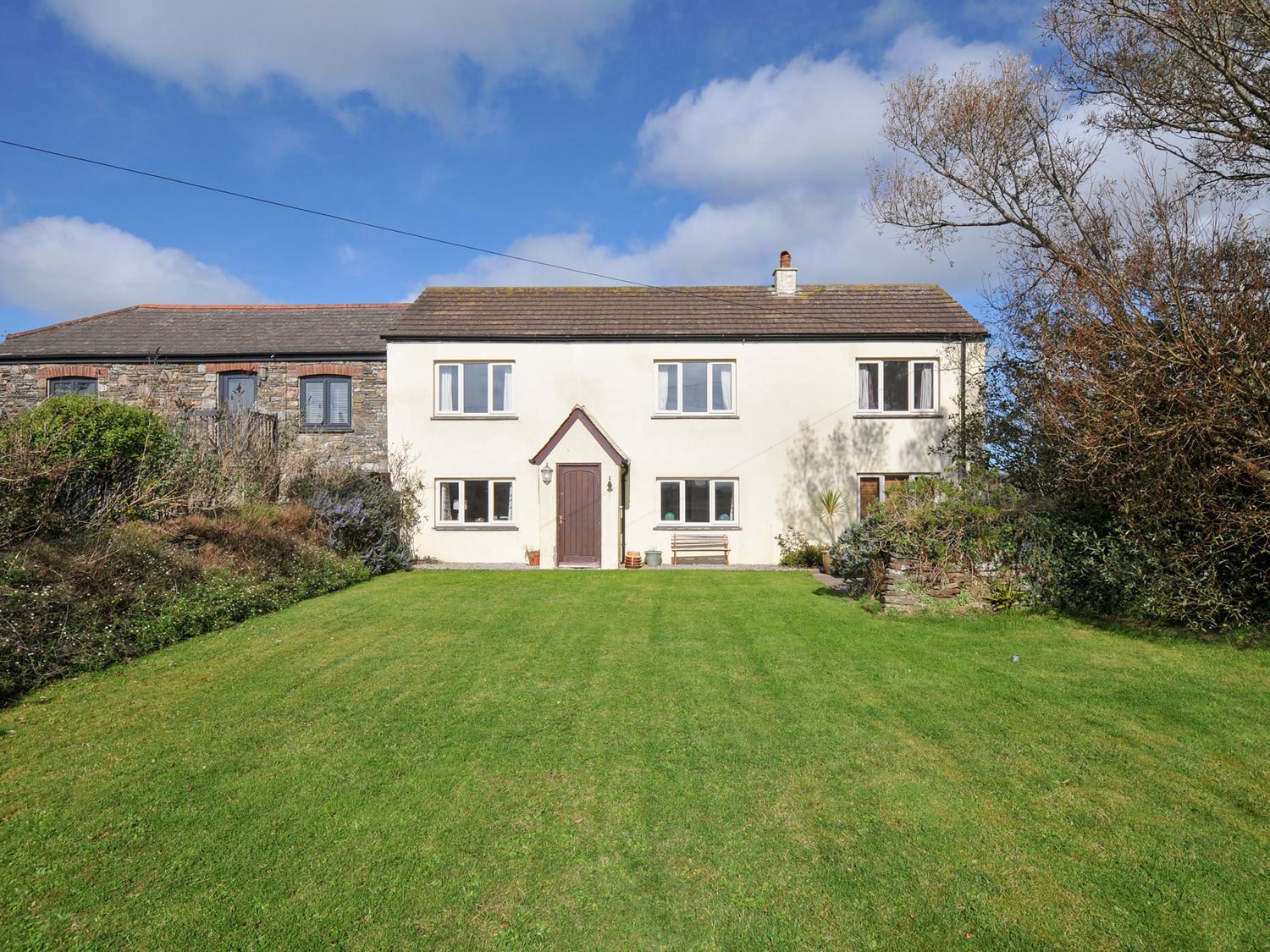 A house with garden and trees at Rosewin Farmhouse near St Minver