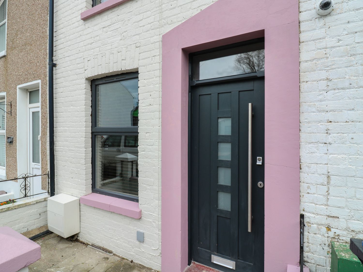 A front entrance with a black door and a window at Seibiant in Ramsgate