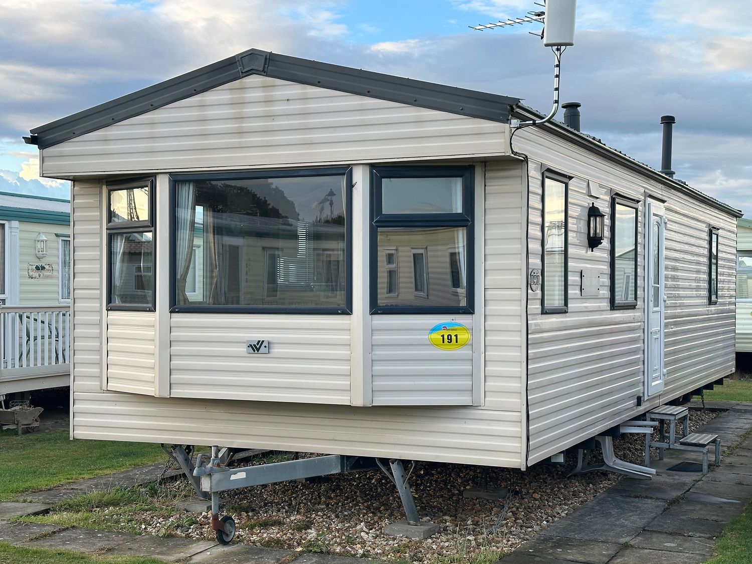 A caravan with windows and a door at Seaview Caravan Park - Holiday Accommodation 20846 Ingoldmells, Skegness
