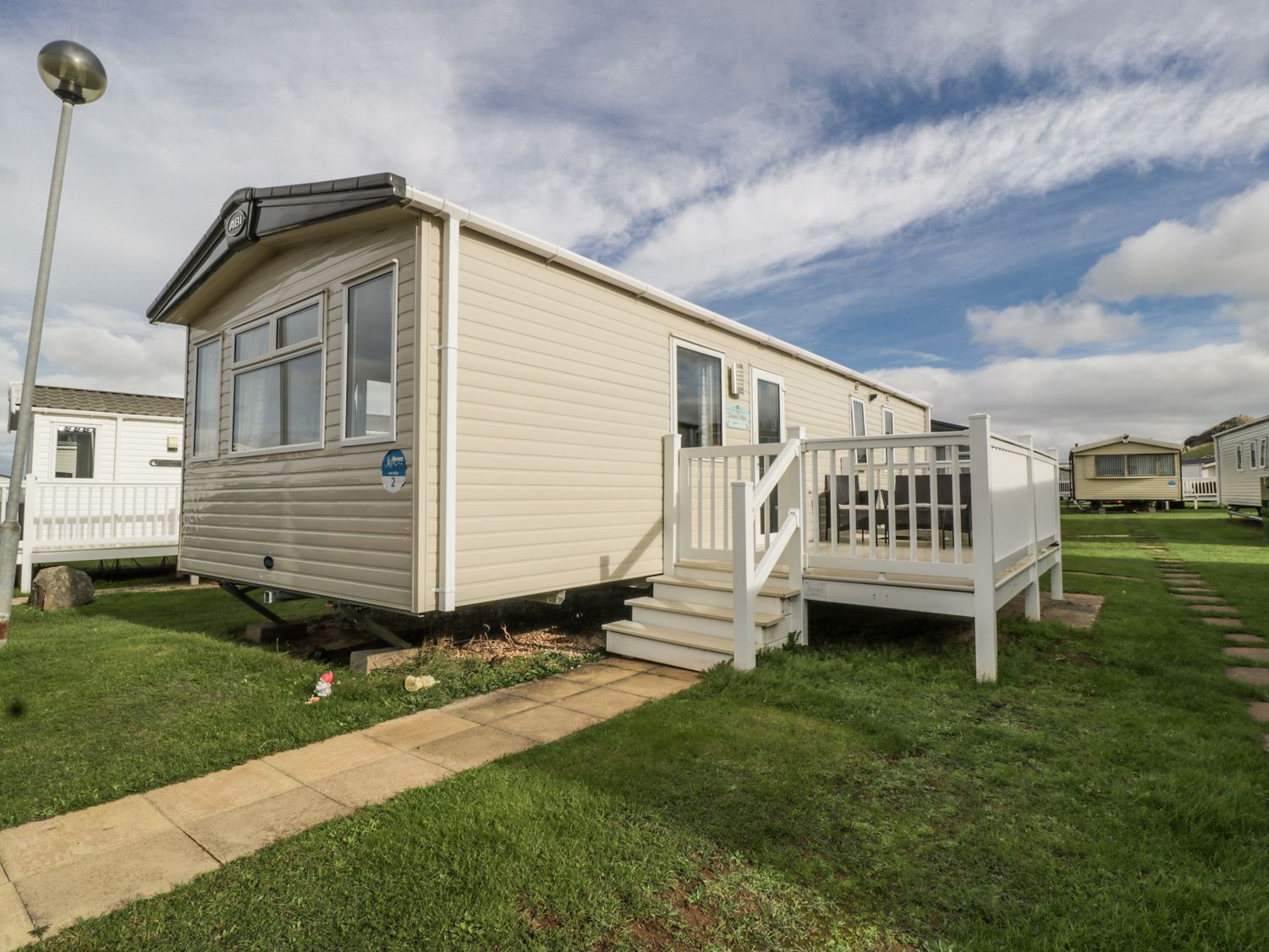 A holiday home with deck and steps at Caravan - 2 Bayside Watchet