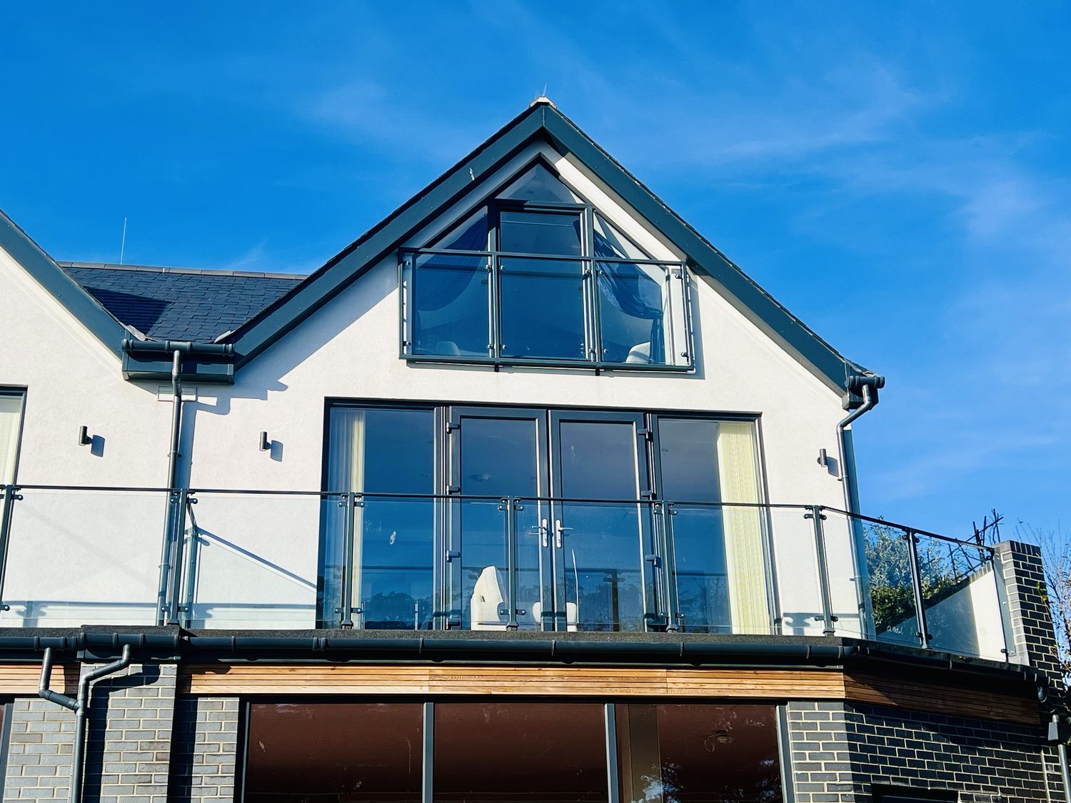 An outdoor view of a house with a balcony at 2A Hamilton Road in Felixstowe, Suffolk