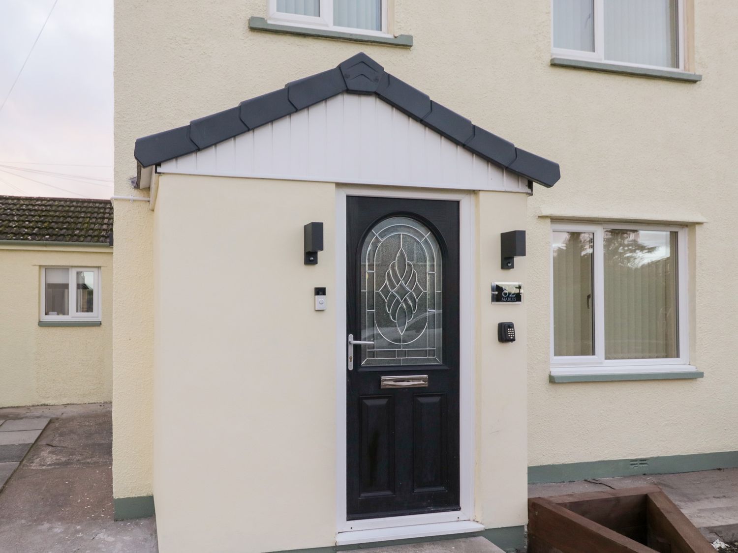 A front entrance with a door at Mables in Wigton