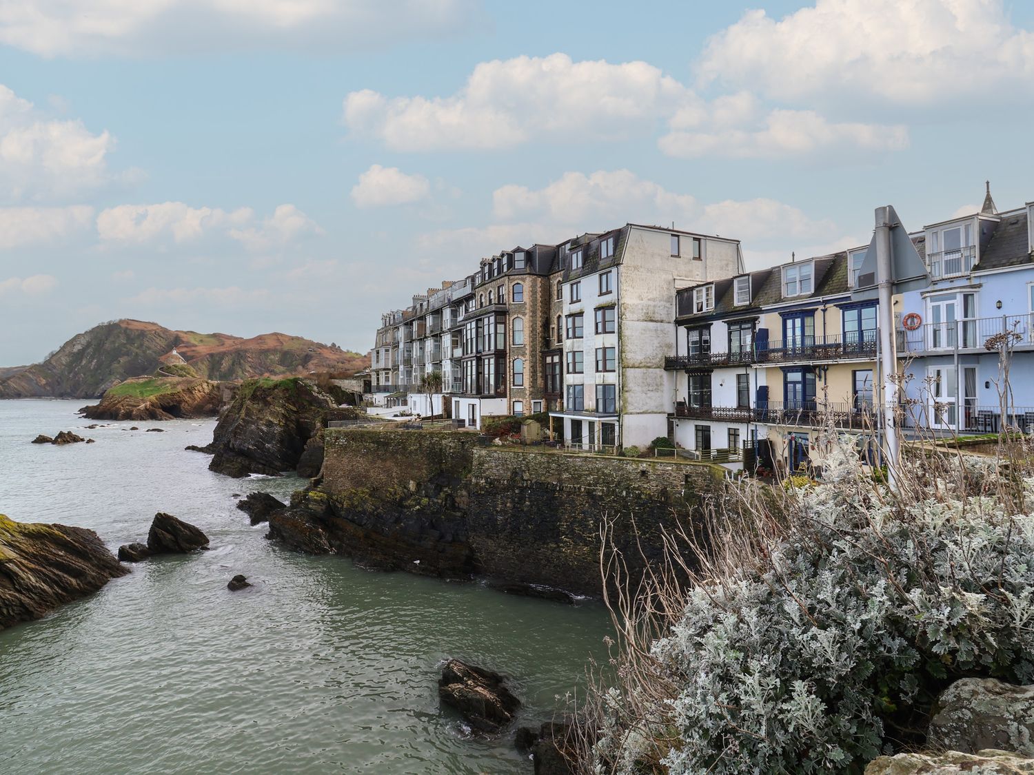 A coastal view of buildings alongside the water at Close to Shore 