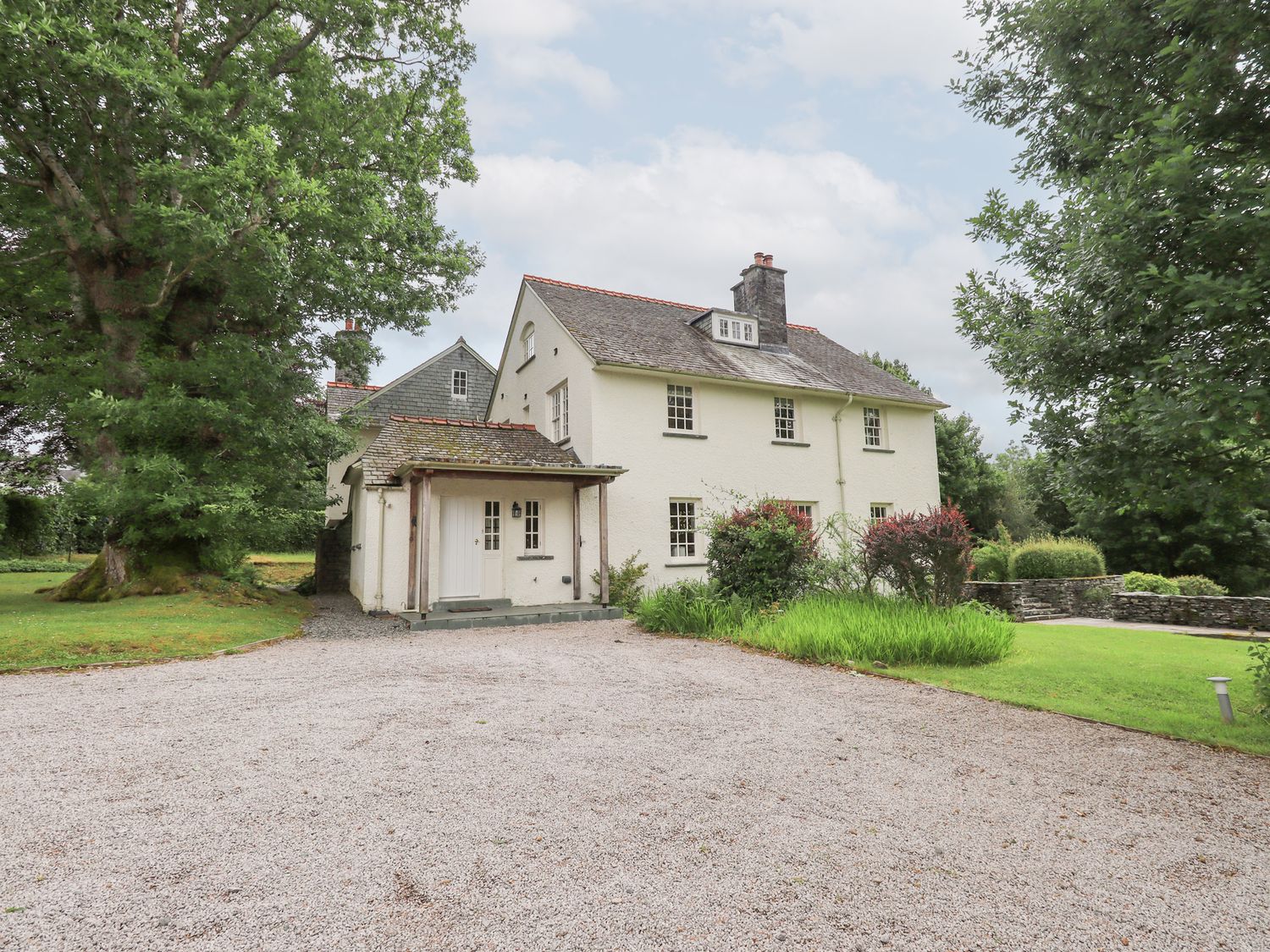 A house with a gravel driveway at Little Ellers Portinscale near Keswick
