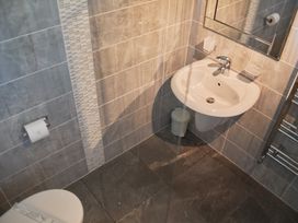 A bathroom with a sink and toilet at Daffodil Lodge in Saltburn-by-the-Sea