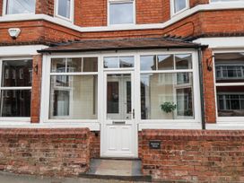A front entrance with a door and windows at Tennyson House in Scarborough