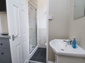 A bathroom with a sink and shower at Tennyson House in Scarborough