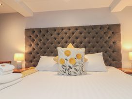 A bedroom with a bed and pillows at Blue Peter @ Engine Shed in Whitby