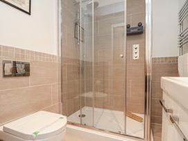 A bathroom with a shower and toilet at Blue Peter @ Engine Shed in Whitby