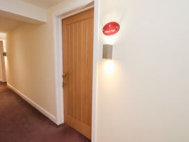 A hallway with a door labeled Olton Hall at Olton Hall @ Engine Shed in Whitby