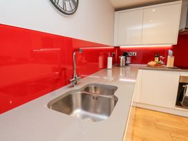 A kitchen with a sink and countertop at Olton Hall @ Engine Shed in Whitby