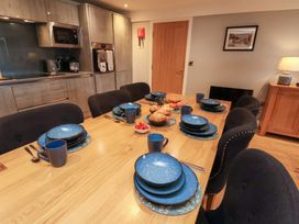 A dining room with table set for meals at Mallard @ Engine Shed in Whitby