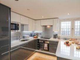 A kitchen with modern appliances and a countertop at George Stephenson @ Engine Shed Whitby