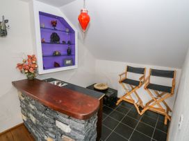 A snug with a bar counter and stools at Ocean Sail House in Termon near Dungloe, County Donegal