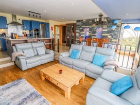 A living room with sofas and a coffee table at Ocean Sail House Termon near Dungloe, County Donegal