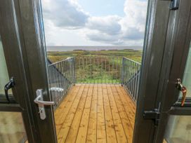 A balcony with a view of the sea at Ocean Sail House, Termon near Dungloe, County Donegal