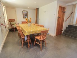 A dining room with a table and chairs at Dale Barton in Wells