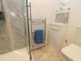 A bathroom with a shower, sink, and towel radiator at Dale Barton in Wells
