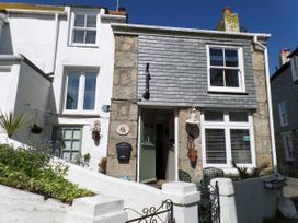 A house with a door and windows at Labour in Vain, St Ives