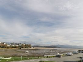 A view of a river and boats at Bay View Apartment in Porthmadog