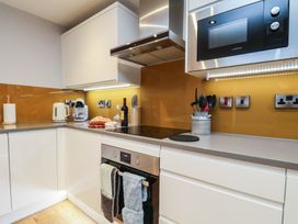 A kitchen with appliances and utensils at Premier, Transit & Lady Hilda @ Engine Shed, Whitby