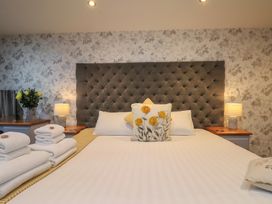 A bedroom with a bed and bedside table at Premier, Transit & Lady Hilda @ Engine Shed, Whitby