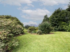 A garden with bushes and trees at High Spy in Keswick