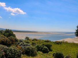 A view of the landscape with sand and water at Bryn Y Mor, Borth Y Gest