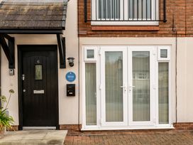 A front door and double doors at Coed y Felin in Conwy
