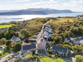 A panoramic view of a residential area overlooking a river at Ty Bach, Great Orme Llandudno