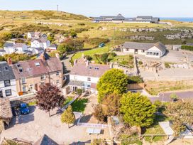 An outdoor area with houses and trees at Ty Bach, Great Orme in Llandudno