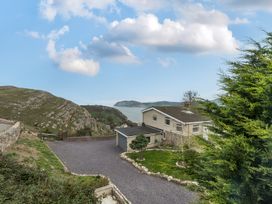 An outdoor area with a house and driveway at Ty Mawr, Great Orme Llandudno